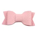 Detailed view of pink faux leather hair bow clip with soft pebble grain texture for girls - Pink