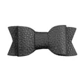 Close-up of matte black PU leather bow hair clip with detailed lychee grain texture - Black