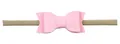 Detailed close-up of pink faux leather bow on a soft nude nylon baby headband - No.3 Pink