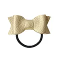 Detailed view of the gold lychee texture leather bow on a black elastic hair tie - Gold