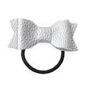 Detail view of silver faux leather bow hair tie with textured lychee pattern finish - Silver Grey