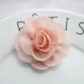 Detailed view of layered peach chiffon fabric rose flower for DIY hair accessories - Snow Bud