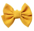 Handmade yellow textured knit bow accessory for DIY hair clips and clothing decorations - Turmeric