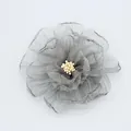 Detail of multi-layered grey chiffon peony brooch with delicate handmade mesh texture - Gray