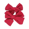 Detailed close-up of dark red textured cotton linen bow clips for young girls - Wine Red