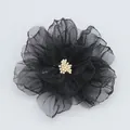 Elegant black mesh flower hair clip with layered tulle petals and white stamen detail - Black
