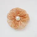Champagne woven petal flower accessory with central pearl and delicate silk texture - Khaki