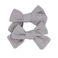 Detailed close-up of light gray linen bow hair clips showing premium woven texture - Gray