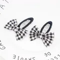 Pair of cute black and white houndstooth bow hair clips for girls with fabric covered BB clips - Black