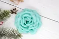 Mint green fabric camellia flower hair clip handcrafted with textile petals on wood - Flat Pad / Light Green