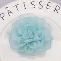 Light blue organza peony hair clip featuring handmade layered fabric petals for women - Blue