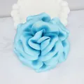 Light blue handmade satin fabric peony flower decoration on a white decorative plate - Blue