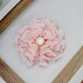 Detail of pink satin peony flower with soft petals and a white pearl center brooch - Pink