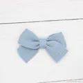 Fiocco per capelli azzurro con trama a nido d'ape per accessori fai-da-te su legno bianco - Griglia Blu