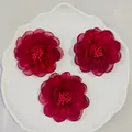 Set of three handmade deep red organza camellia fabric flowers with pink stamen centers - Flat Pad / Burgundy