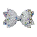 Sparkly white glitter bow accessory with colorful sequins and ruffled petal edges - White