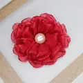 Elegant red chiffon peony brooch with a central pearl and layered burnt edge petals - Dark Red