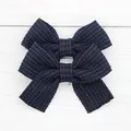 Pair of navy blue tweed bow hair clips for girls with elegant cross-weave texture - Deep Black