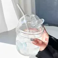 Macro shot of glass cup with iridescent 3D butterfly detail and matching glass straw - Blue Butterfly