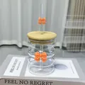 Creative glass cup with orange ribbon detail, bamboo lid and glass straw accessory - Orange