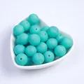 Détail macro de perles en silicone bleu tiffany à motif marbre pour bijoux DIY en bol cœur - Marbré Sarcelle (14#)