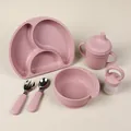 Detail view of the 6-piece baby silicone dining set including plates and suction bowls - Pale Pink Plate Bowl Feeder Cup Fork Spoon