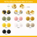 40er-Set 15mm Silikonperlen mit Blumenmuster für DIY Armbänder in 10 Pastellfarben - Sonnenblumen- und einfarbiges Muster (Stil 5)