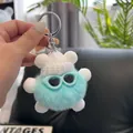 Close-up of fluffy blue rabbit fur keychain with a knit hat and stylish sunglasses - Fresh Blue
