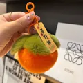 Portachiavi in peluche a forma di cachi arancione con foglie verdi e targhetta fortuna - Buona Fortuna