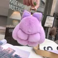 Portachiavi con coniglio in vera pelliccia viola e fiocco con anello in metallo oro - Violetto