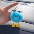 Blue plush monster keychain with cute duck feet and golden clasp for car bags - Blue