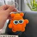 Cute orange faux fur bear keychain with a knitted hat and sunglasses for bag charms - Orange