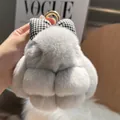 Detailed view of grey plush bunny keychain with a plaid bow and gold metal ring - Light Gray