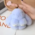 Light blue faux rabbit fur bunny keychain with golden metal clasp and fluffy texture - Sky Blue