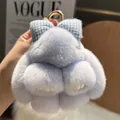 Plush light blue rabbit keychain with gingham bow and golden ring on fuzzy background - Sky Blue
