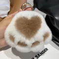 Close-up of fluffy white cat paw plush keychain with brown heart patterns and gold ring - Milk Tea