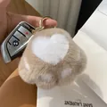 Cute cat paw plush keychain in light brown faux fur with golden ring and heart detail - Light Coffee