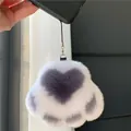 Cute cat paw plush keychain made of real rabbit fur hanging on a mobile phone case - Grey Color-block