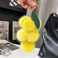 Porte-clés mignon en fourrure de renard jaune en forme de raisin avec feuille verte - Jaune