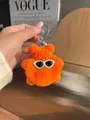 Portachiavi a forma di orso arancione con cappello in maglia e occhiali da sole - Arancione