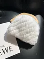 Detail of soft white faux rabbit fur hat texture on elegant minimalist props - White