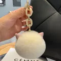 Cute white faux rex rabbit fur pompom keychain with pink cat ears and acrylic chain - Off White