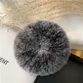 Macro shot of gray rabbit fur scrunchie with soft plush texture and elegant vintage look - Frost Black
