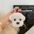 Detail of soft plush puppy keychain with fluffy texture and gold metal ring - Silver Gray