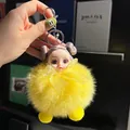 Llavero de muñeca de piel de zorro amarilla con moños morados para bolsos y llaves - Amarillo