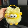 Vibrant yellow plush monster keychain with a soft bow and a plastic ring handle - Yellow