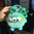 Schattige muntgroene pluche monster sleutelhanger met groene strik en oogjes - Muntgroen