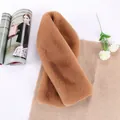 Detailed view of the dense faux rabbit fur scarf in caramel color with crossover design - Dark Khaki