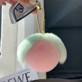 Pink peach faux fur pompom keychain with green leaves and a golden metal clasp - Pink and Green (Water Drop Buckle)