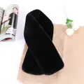 Plush black faux rabbit fur scarf for winter warmth on a stylish minimalist background - Black